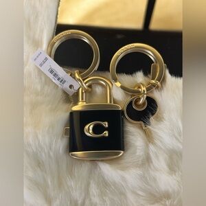 NWT COACH Lock And Key Ring Style C1679 Black And Gold